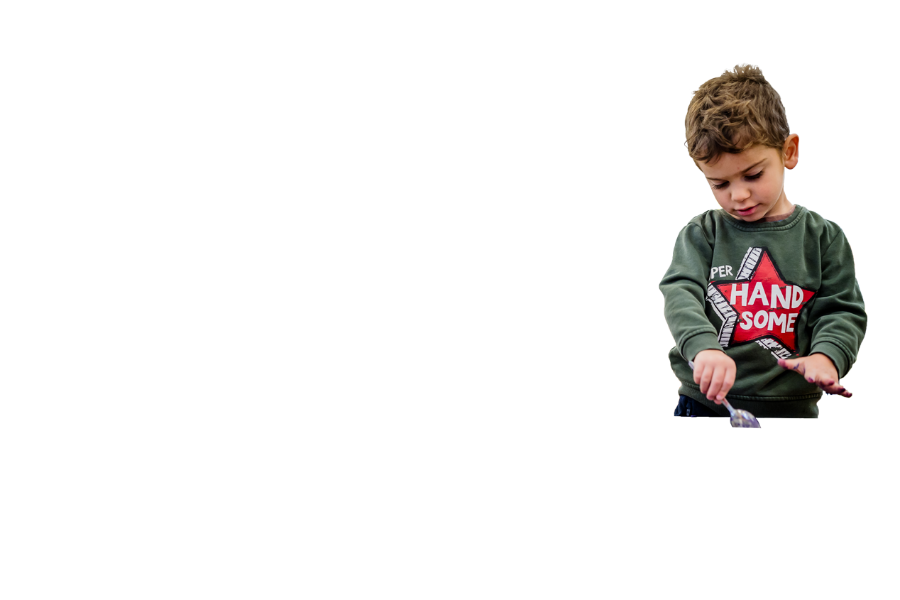 boy in nursery playing with sand at Ohr Belgravia Nursery